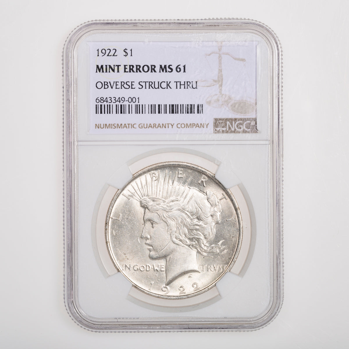 US $1 Peace 1922 Mint Error Obverse Struck Thru NGC MS-61