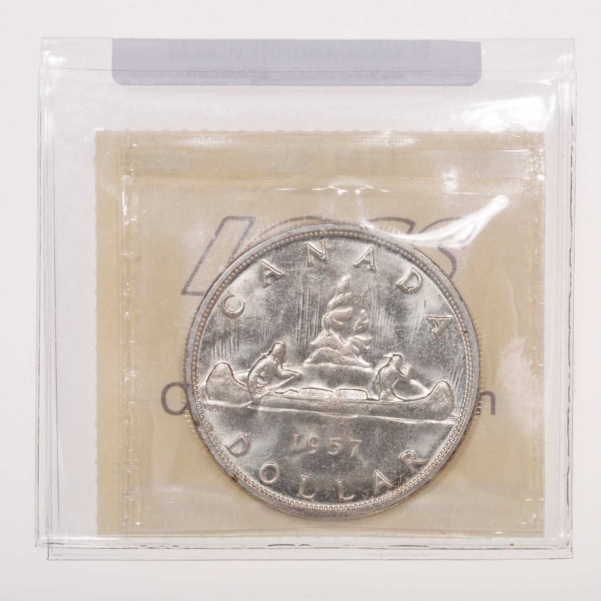 $1 1957 ICCS MS-65